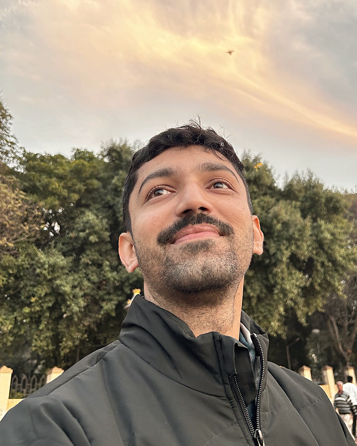Bhagyesh Bhatt, photographed outdoors looking up.